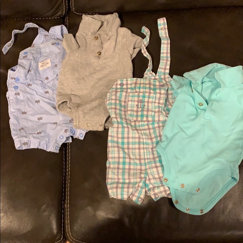 A pair of overall/onesie sets (Carter’s)